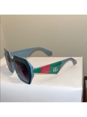 Gucci Light Blue Cat-Eye Sunglasses with Green-Red Stripe Accent